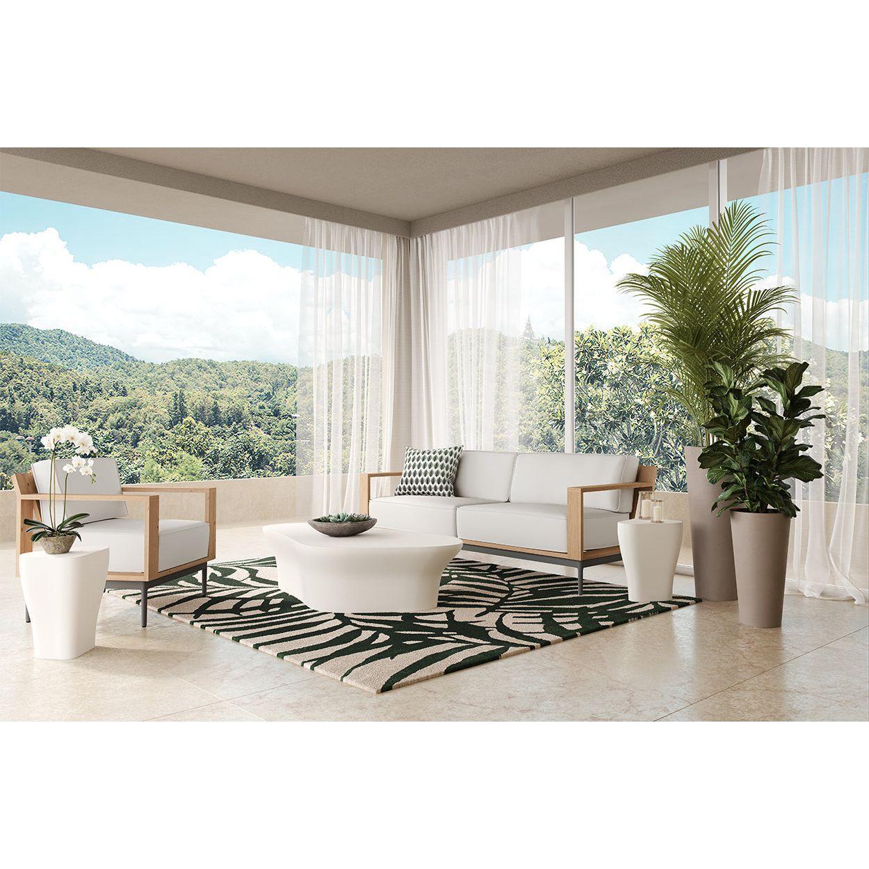 Table d'appoint d'extérieur contemporaine en béton blanc avec une forme organique compacte pour balcon